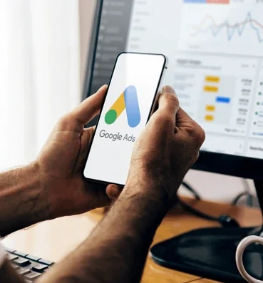 man using mobile phone google 600nw 2430429797 e1774884734913